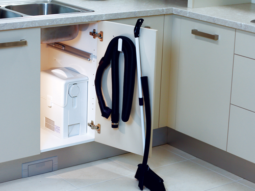 Kitty vac cleaning system mounted into polyurethane stylish cabinet configuration.