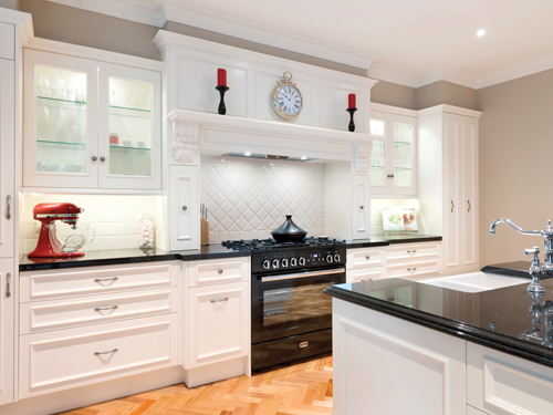 Custom Kitchen with hard wood bench tops and built in Accessories. Traditional / federation style design.