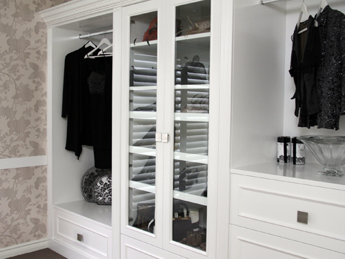 Built in custom wardrobes and cabinets with glass doors and white polyurethane cabinets